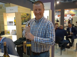 Damijan Podversic with a bottle of Ribolla Gialla 2010